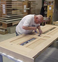 Ben finishing a custom door